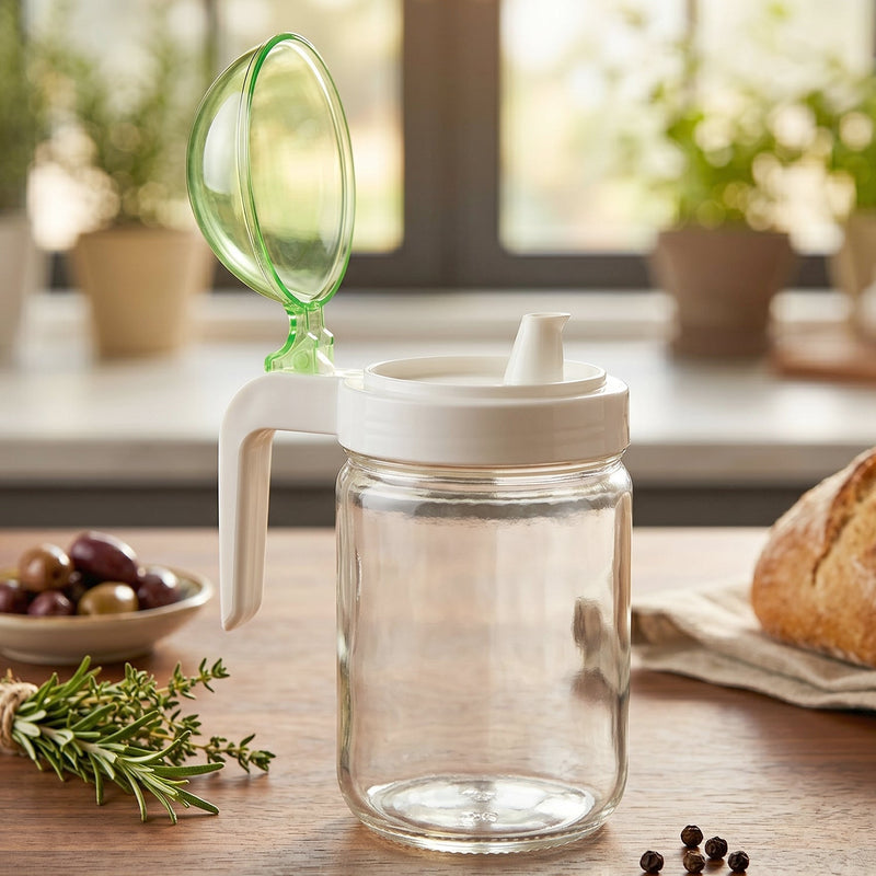 Kitchen oil dispenser bottle with green lid for controlled pouring