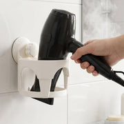Compact suction cup hair dryer holder for bathroom