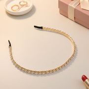 Trendy metal hair band with shining crystal stones