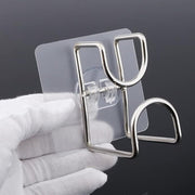 Transparent double loop adhesive wall hook installed on smooth wall