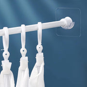 Plastic wall hook with strong hold on smooth surfaces