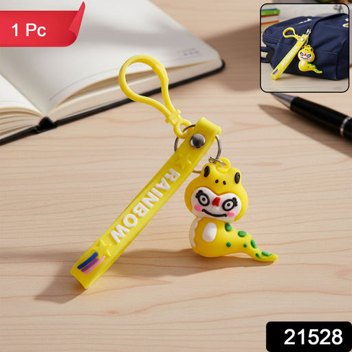 Close-up of dinosaur cartoon keychain showing bright rainbow strap and sturdy metal ring