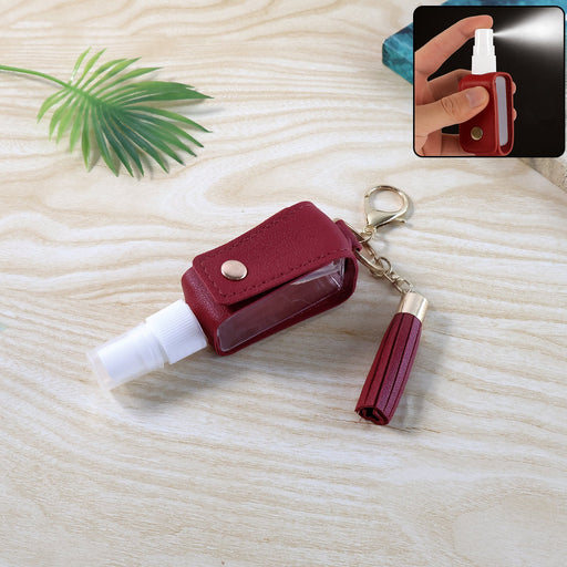 Faux leather hand sanitizer holder keychain featuring elegant tassel