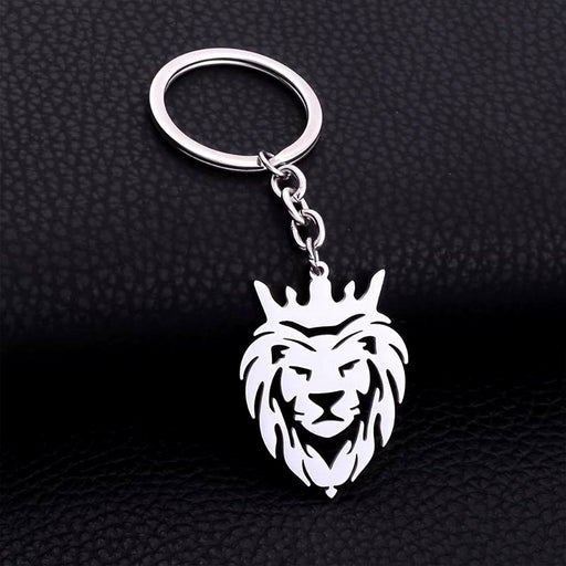 Durable stainless steel lion head keychain with crown design on a white background