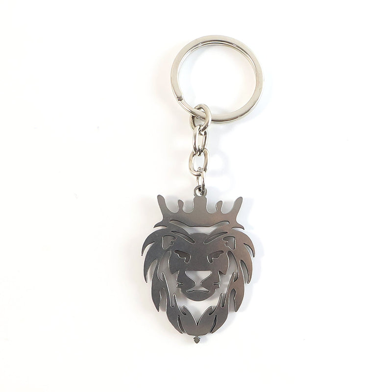 Angled view of metal lion head keychain highlighting textured craftsmanship