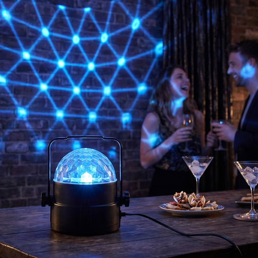 LED Disco Light Projector casting colorful star and disco patterns on a wall.