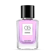 Hand holding Charade Eau De Parfum bottle showcasing premium design