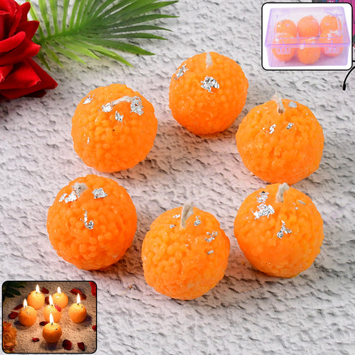 Set of 6 laddu-shaped wax candles with silver leaf decoration for festive lighting