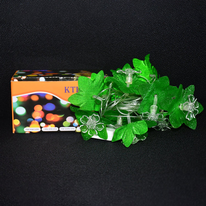 Festive multi-color Leaf & Flower LED Decorative String Light illuminating a home wall
