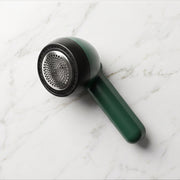 Compact lint remover for fabric grooming and wardrobe care