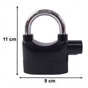 Hand holding the Security Alarm Padlock, showing its size and ergonomic grip.