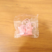 Cute couple bear keychain in lifestyle setting for gifting