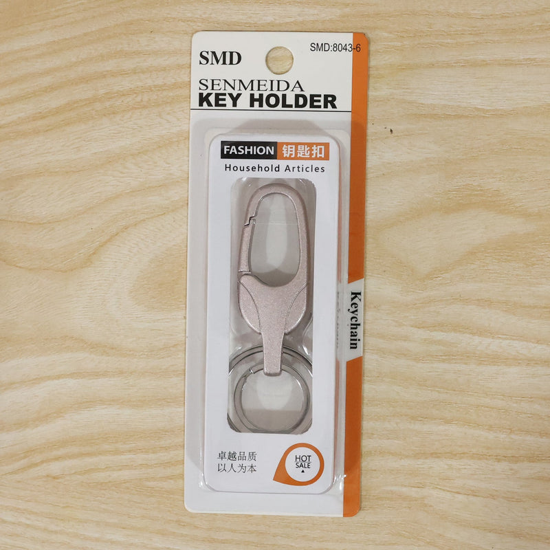 Metal keychain displayed with size reference