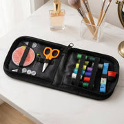 Emergency sewing kit set for travel, showing essential tools laid out.