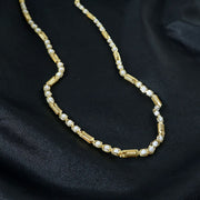 Patterned stone design on gold tone chain necklace