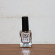 Fashionable nails painted with Metallic Gold Nail Polish, perfect for parties
