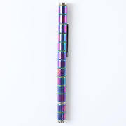 The magnetic pen creatively arranged into various abstract shapes on a desk.