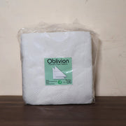 Multicolor tissue paper effectively cleaning a small spill on a kitchen surface.