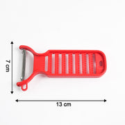 Close-up view of stainless steel grater and peeler for ginger