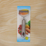 Compact stainless steel vegetable peeler on countertop