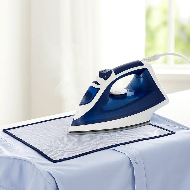 Hand holding transparent heat-resistant ironing mesh press cloth