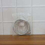 In-use high-speed LAN Ethernet cable connecting devices in office