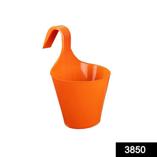 Close-up of a vibrant plastic hanging planter pot.