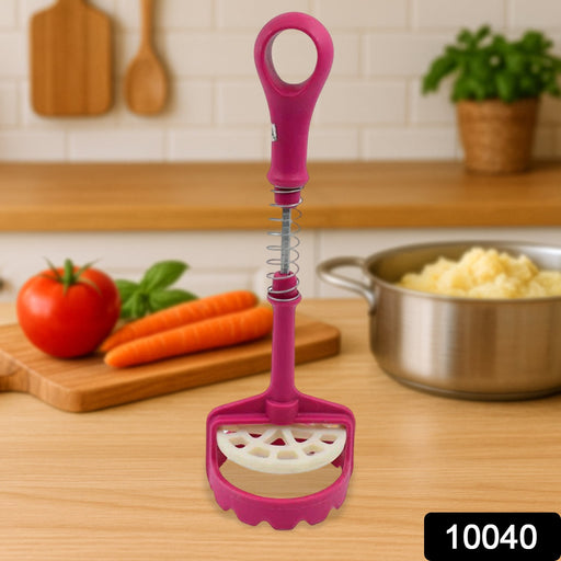Close-up of spring-loaded mechanism on the multi-functional potato masher.