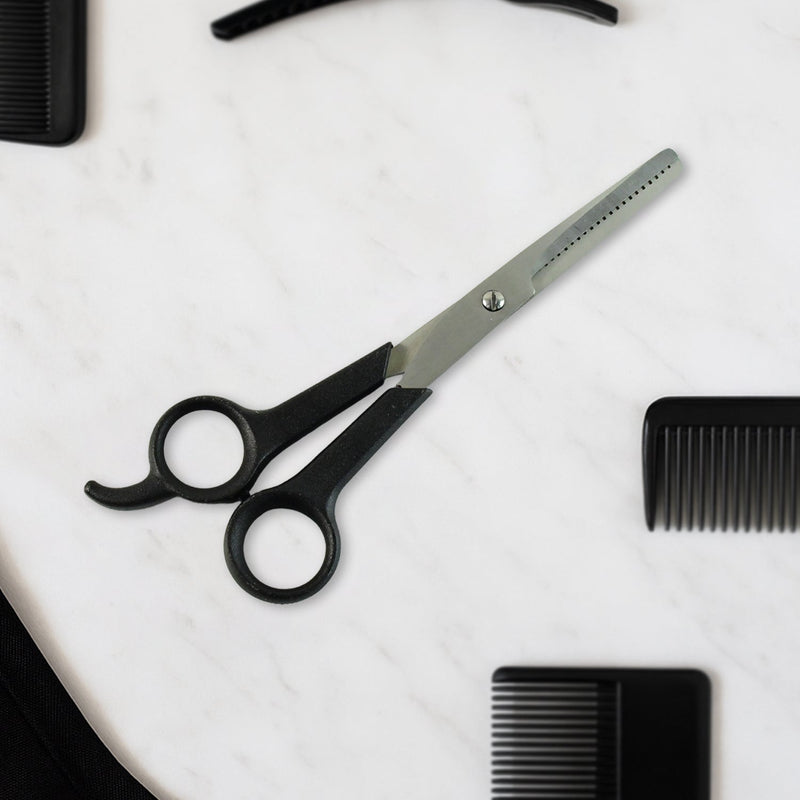 Hair thinning scissors showing detailed micro-toothed blade for bulk reduction