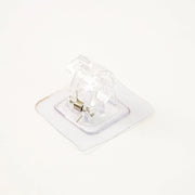 Self-adhesive curtain rail clip installed on wall for lightweight curtains
