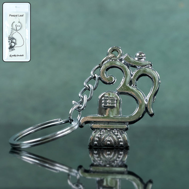 Om Shivling metal keychain showing front view and spiritual design