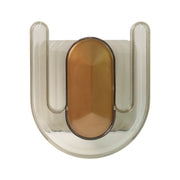 Mounted slipper stand holding a pair of slippers on the wall