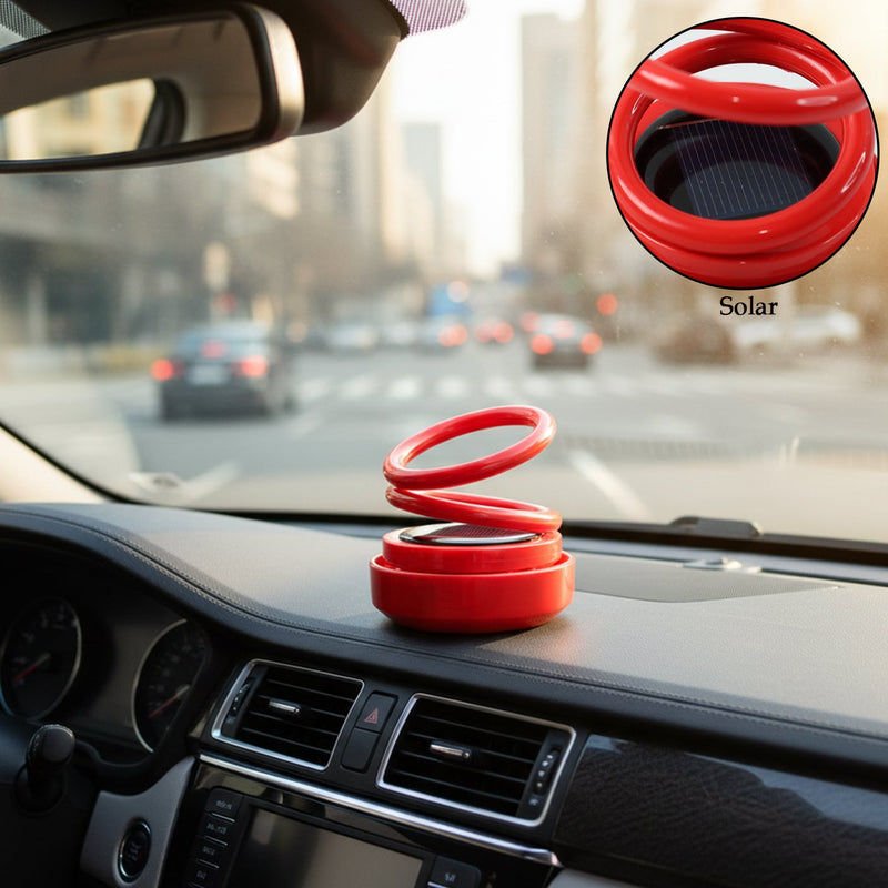 Rotating solar aroma diffuser installed inside car interior