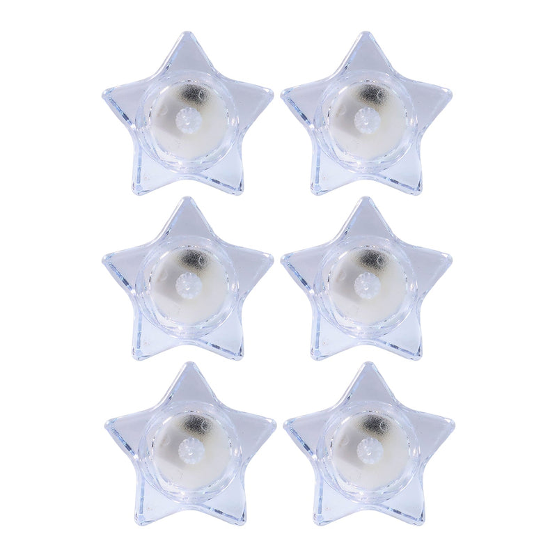 Battery operated LED candles in star-shaped holders for safe lighting
