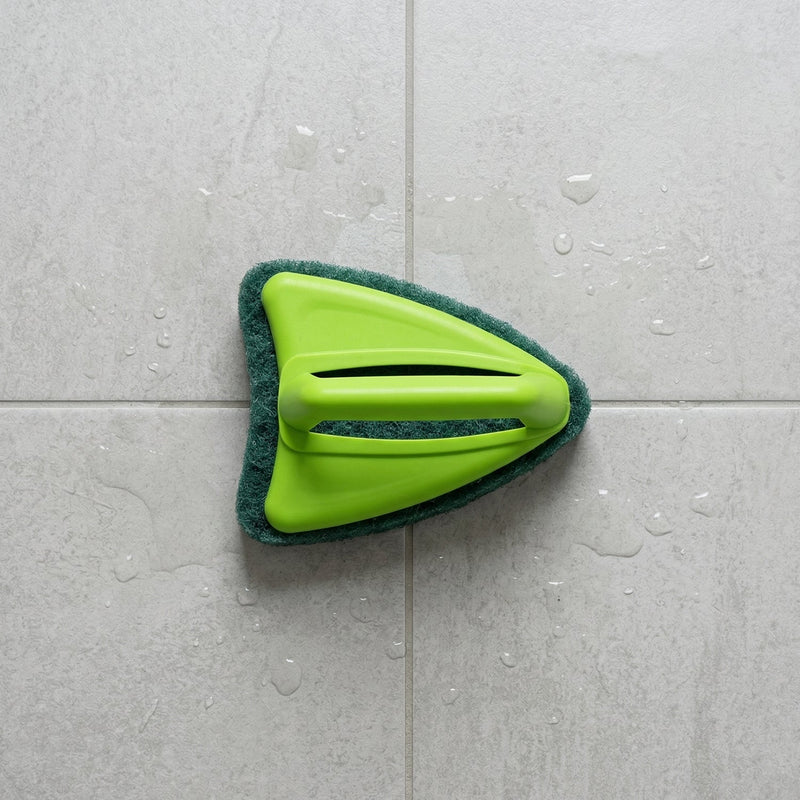 Ergonomic plastic handle of the bathroom cleaning brush for comfortable, dry grip.