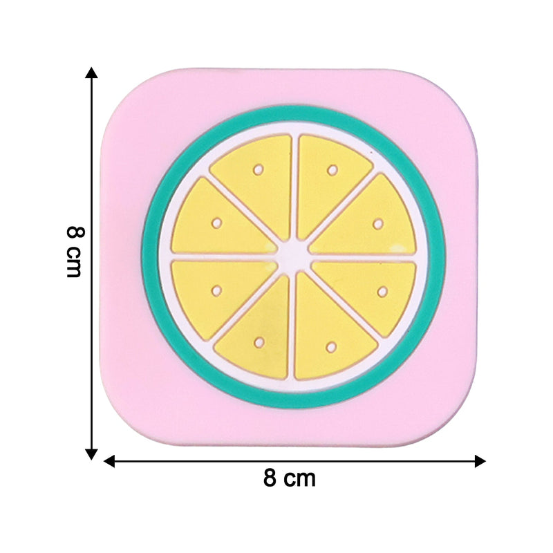 Bright yellow lemon silicone drink coaster displayed on coffee table