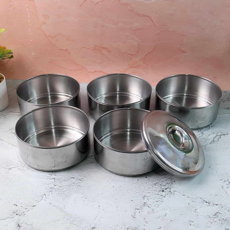 Closed stainless steel lunch box showing its sleek, round design.
