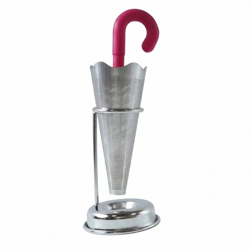 Stainless steel umbrella tea infuser resting securely on its dedicated drip tray stand, preventing spills.