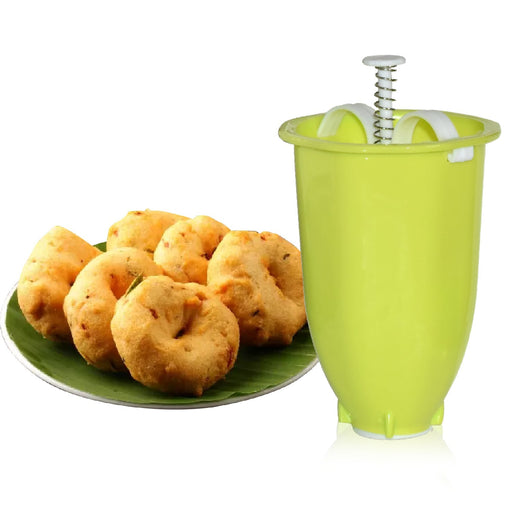 The durable plastic Medu Vada Maker ensuring perfectly shaped vadas every time.