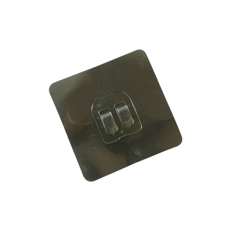GlimmerHome transparent hook securely attached to a glass surface, blending in.