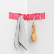 Compact wall-mounted hook rack organizer ideal for towels and accessories