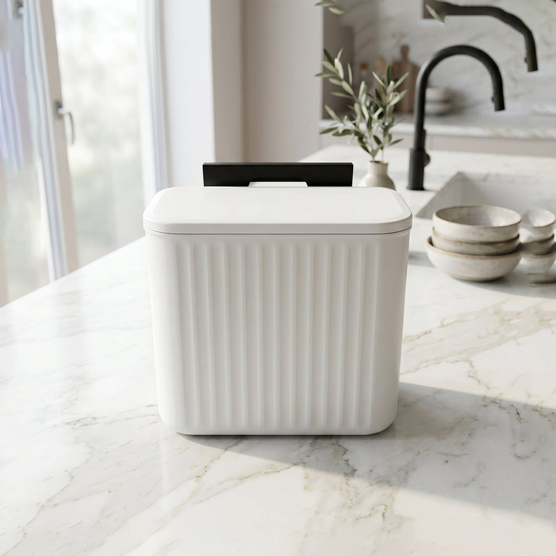 Side view of small kitchen waste bin