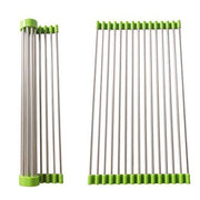 Stainless steel kitchen sink drain rack, extended over a sink for drying dishes.