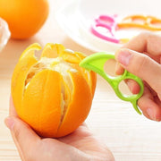 A Snail Orange Peeler with its unique ring design, ready to use for effortless citrus peeling.