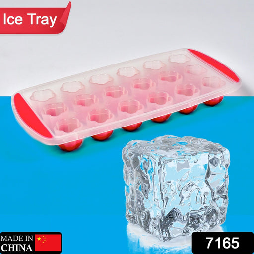 Close-up of a perfectly formed flower-shaped ice cube in a refreshing drink.
