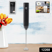 Compact battery-operated milk frother with ergonomic handle