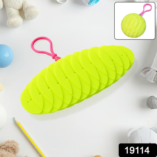 Worm fidget toy hanging from a backpack for portable stress relief