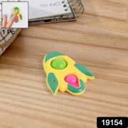 Hand holding the compact rocket fidget keychain toy showing its size