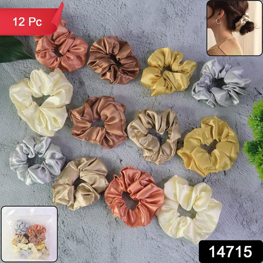 Close-up of colorful satin hair scrunchies on white background showing smooth fabric