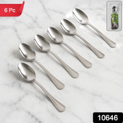 Six stainless steel dining spoons neatly arranged in a set